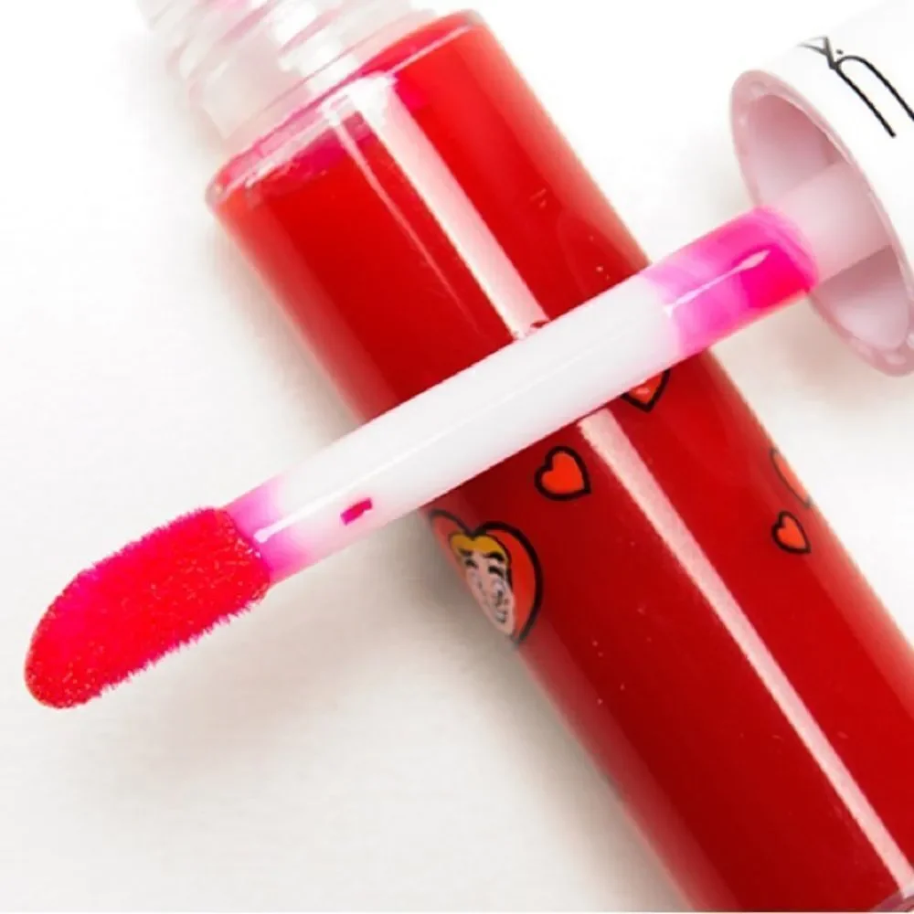 NIB MAC Archie’s Girls Lipglass in “Strawberry Malt”